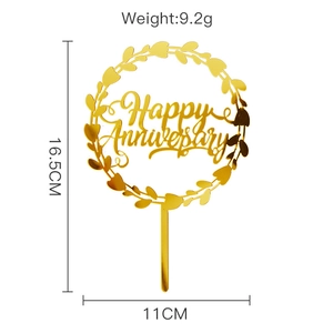 Detailed view of gold acrylic cake topper with Happy Anniversary text and 16.5cm dimensions