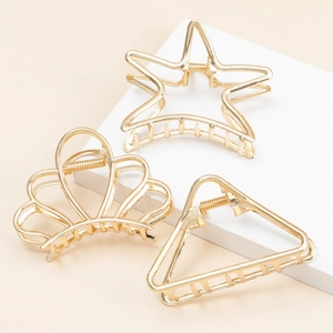 Golden geometric hair claws in star, crown, and triangle shapes for elegant hairstyles