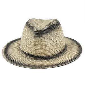 Detail of woven straw fedora with grey gradient finish on a plain white background