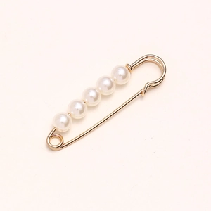 Adjustable pearl waist buckle pin in gold finish for clothing fit and decoration