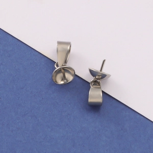 Detailed macro view of two silver stainless steel pendant pinch bails for DIY jewelry