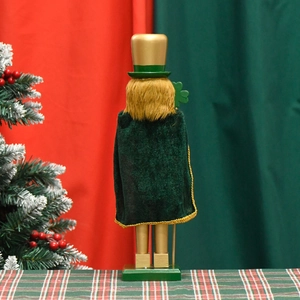 38cm Irish nutcracker back view in green and gold wood standing in festive Christmas scene
