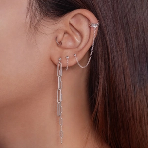 Close-up of S925 sterling silver tassel earrings with pearls and crystal paperclip chain