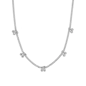 Detail of silver cherry pendant necklace featuring five polished fruit charms on fine chain
