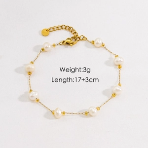 Detail view of pearl and gold titanium steel bracelet showing 17+3cm length and 3g weight