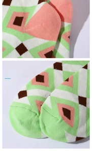 Detail view of seamless toe and geometric pattern on cotton blend mid-calf socks