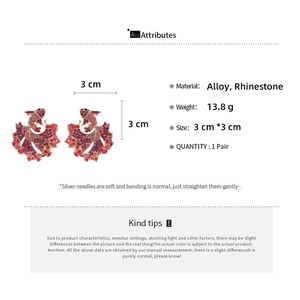 Detail view of koi fish earrings with rhinestones showing 3x3cm size dimensions