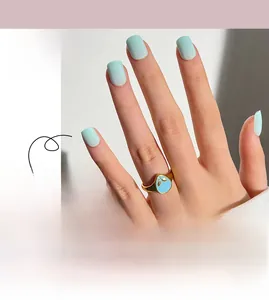 Matte light blue press-on nails in short square shape shown on hand with collection view