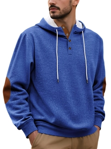 Detail of men's blue hoodie with buttoned henley neck and brown elbow patches
