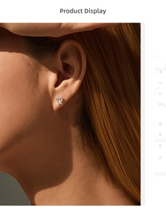 Close-up of S925 silver open heart stud earrings with sparkling pavé moissanite stones