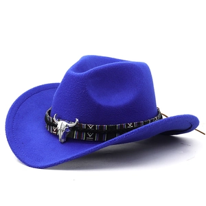 Royal blue wool cowboy hat with patterned band and silver bull skull metal ornament