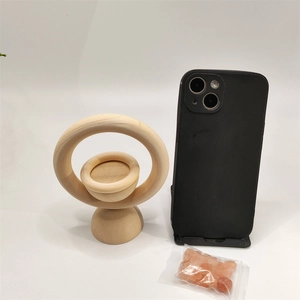 Vertical wooden ring essential oil diffuser with natural wood finish and pink crystals