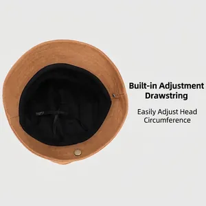 Brown knit fisherman hat featuring adjustable inner drawstring and soft black lining