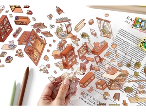 Close-up of PET 3D coffee and bakery theme stickers on a scrapbook page with transparent details