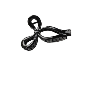 Glossy black hollow butterfly hair claw clip with elegant geometric jelly color design