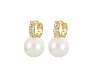 Close-up of gold pearl earrings with micro-set rhinestones on a clean white background