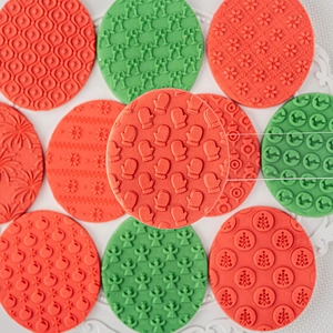 Christmas fondant cookie molds featuring reindeer and snowflake embossed patterns