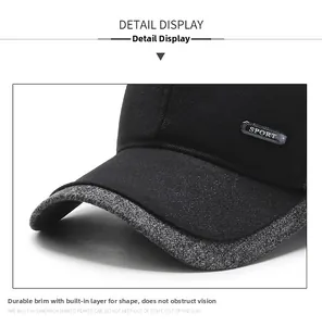 Detailed macro view of cotton baseball cap brim with grey trim and sport metal plate