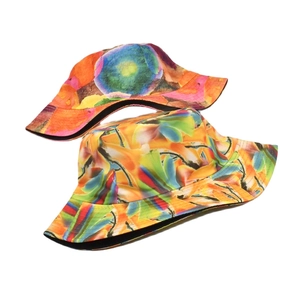 Abstract tie-dye bucket hat with colorful floral print for outdoor sun protection