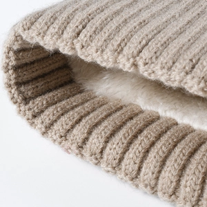 Women's warm winter beanie with khaki ribbed knit and soft white fleece lining