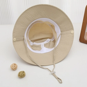 Beige wide-brim polyester sun hat for kids with adjustable drawstring and smiley accent