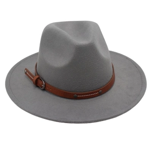 Close-up of gray wool fedora hat with brown leather belt buckle and metal stud detail