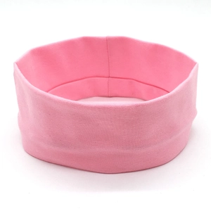 Detailed texture of pink elastic knit yoga headband with seamless stitching for fitness