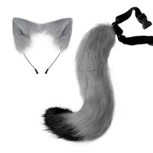 Detail of gray faux fur fox ears headband and matching tail with adjustable black belt