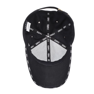 Internal view of black baseball cap with embroidered seams and branded inner tape
