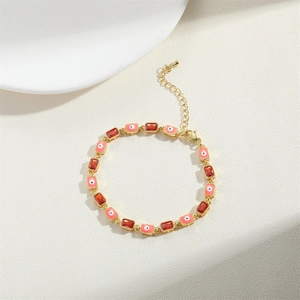 Vintage style 14K gold plated bracelet with red zircon and pink evil eye charms