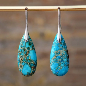 Bohemian teardrop earrings with natural blue stone texture on silver hooks