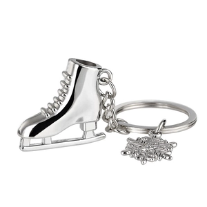 Porte-clés de sport d'hiver en argent avec pendentifs de patins à glace et flocons