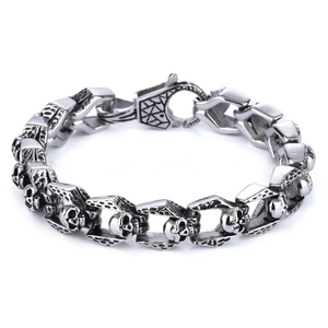 Vintage stainless steel skull link bracelet for men with detailed silver-tone metal carving