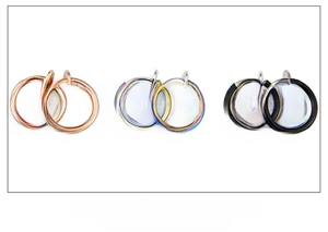 Detail showing non-pierced spring clip earrings in rose gold, rainbow and black finishes