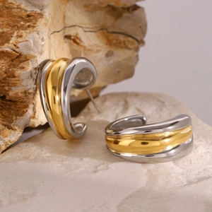 Polished two-tone C-shape hoop earrings with gold and silver wavy metal texture