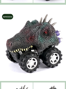 Detailed view of Spinosaurus monster truck with off-road tires and textured dino skin