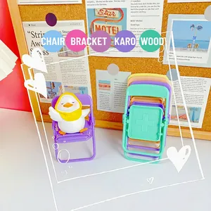 Miniature colorful folding chair phone stands for desktop decor in assorted vivid colors