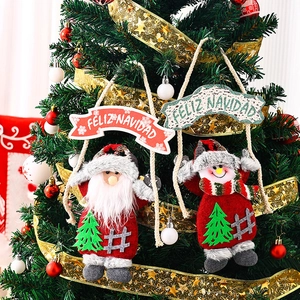 Plush Santa and Snowman tree hanging ornaments with Feliz Navidad wooden sign decoration