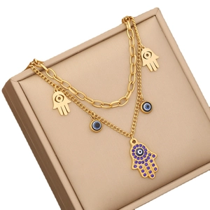 Golden double-layer stainless steel necklace featuring Evil Eye and Hamsa Hand charms