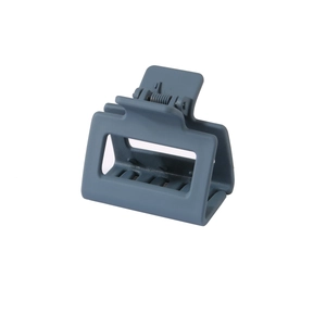 Detail view of 5cm square matte grey-blue hair claw clip with cutout design