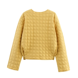 Quilted yellow jacket for women featuring round neck and classic square stitch pattern