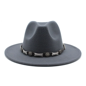 Detailed macro view of gray wool fedora hat with vintage star metallic band decor