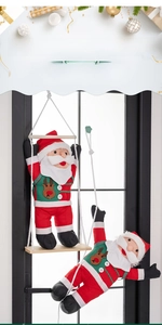 Detail view of two Santa Claus figurines climbing a wooden rope ladder for festive decoration
