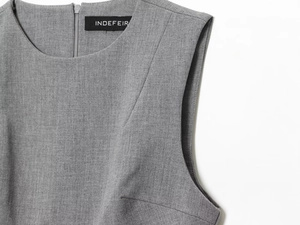 Detailed close-up of the grey satin texture and premium stitching on the shoulder seam