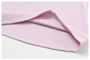 Close-up of pink quick-dry yoga top featuring warm fleece lining and neat stitching