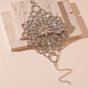 Elegant silver ring hand chain with sparkling rhinestones and bohemian floral patterns