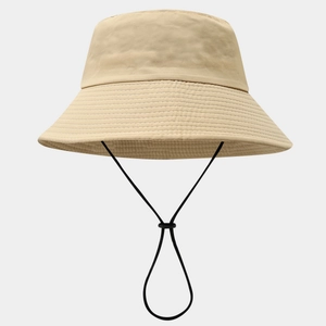 Detail of khaki sun hat featuring reinforced brim stitching and adjustable windproof cord