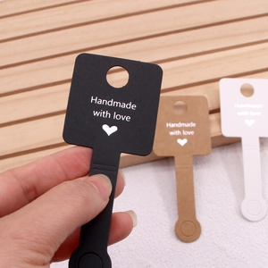 Three-color foldable paper display cards for hair ties and jewelry in black brown and white