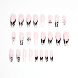 French ballet press-on nails with black and white marble patterns and silver gothic crosses