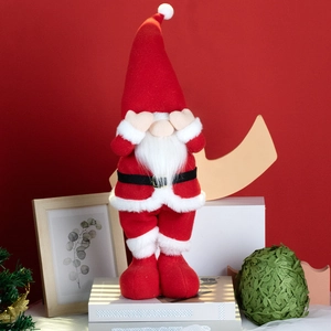 Standing faceless Christmas gnome doll with red hat and white beard holiday decor
